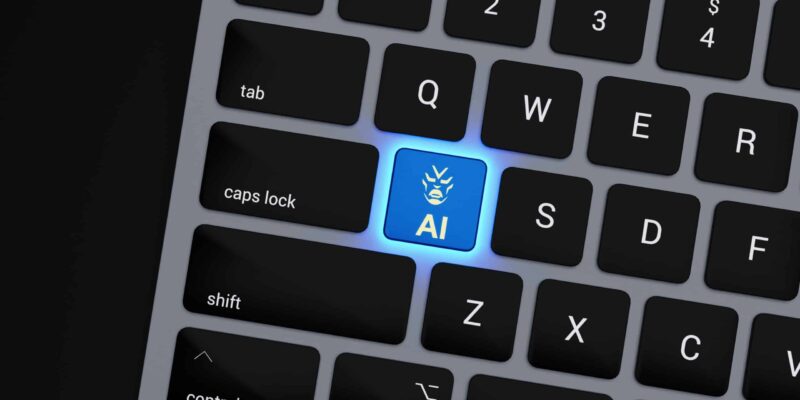 a close up of a keyboard with a blue button