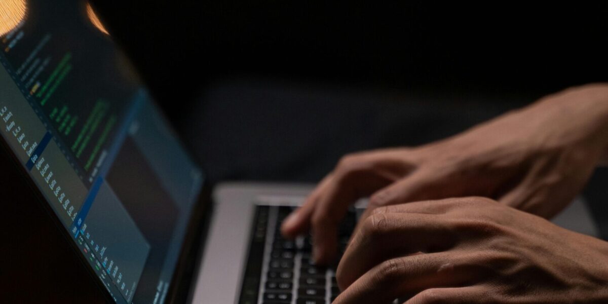 person-using-silver-and-black-laptop-computer