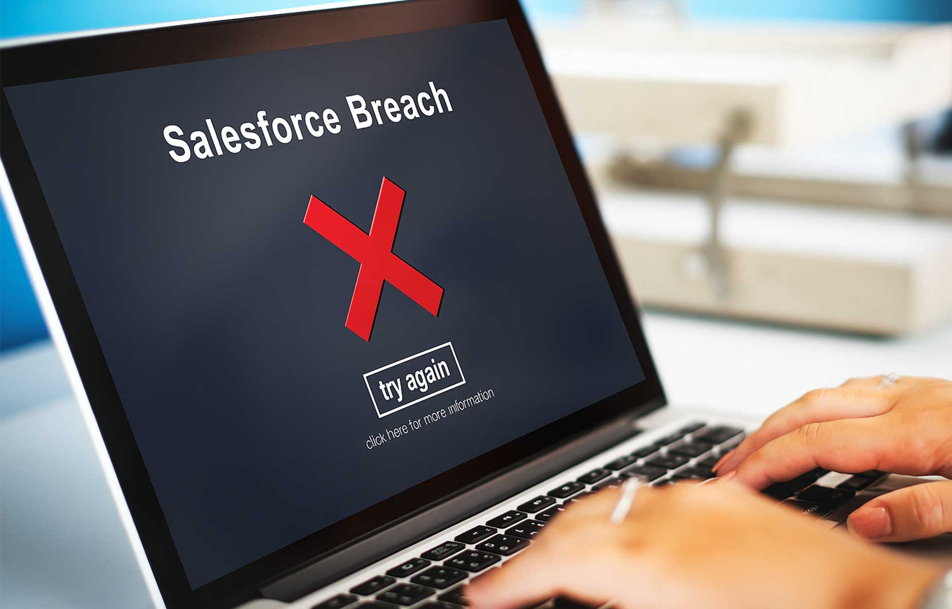 Laptop screen showing Salesforce breach security warning highlighting data breach and cybersecurity risk.