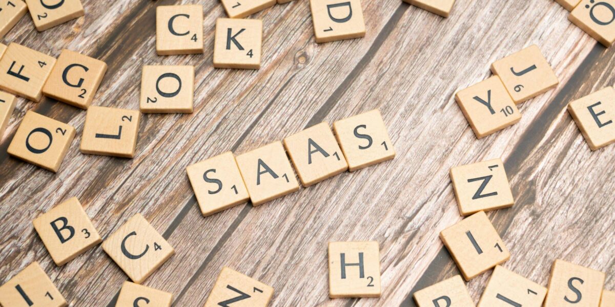 scrabble-letters-spelling-saas-on-a-wooden-tabl
